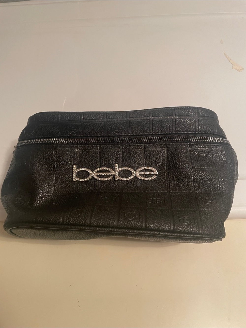 bebe Black Embossed Toiletry Bag with Rhinestone Logo